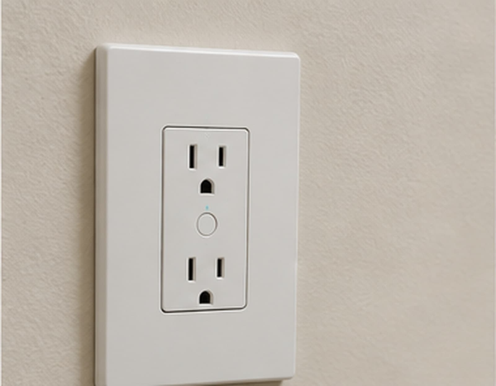 A smart wall outlet with a status indicator installed on a wall